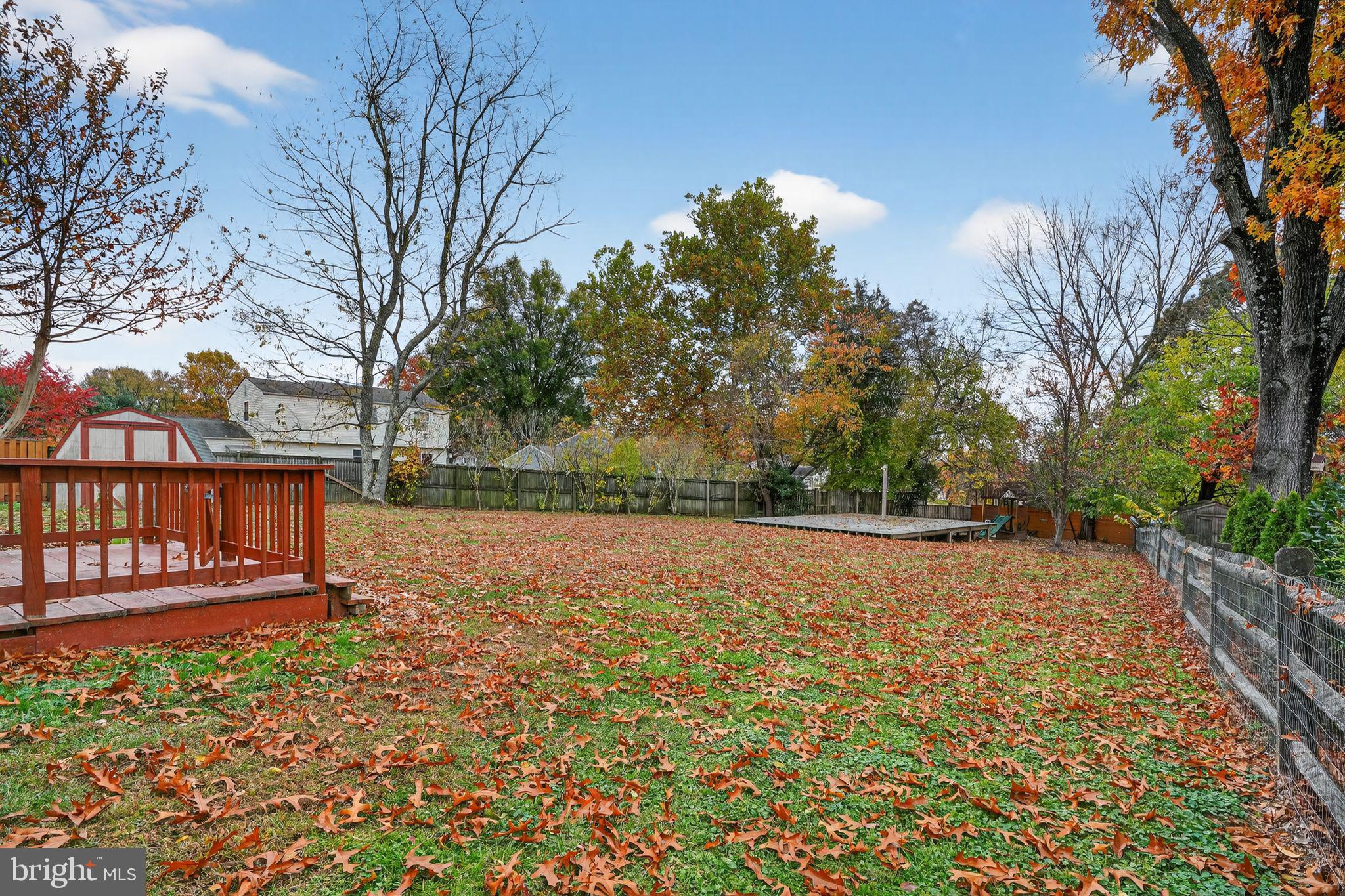 1513 Rainbow Drive Silver Spring, MD 20905 - Photo 46 of 58 a view of a yard with wooden fence