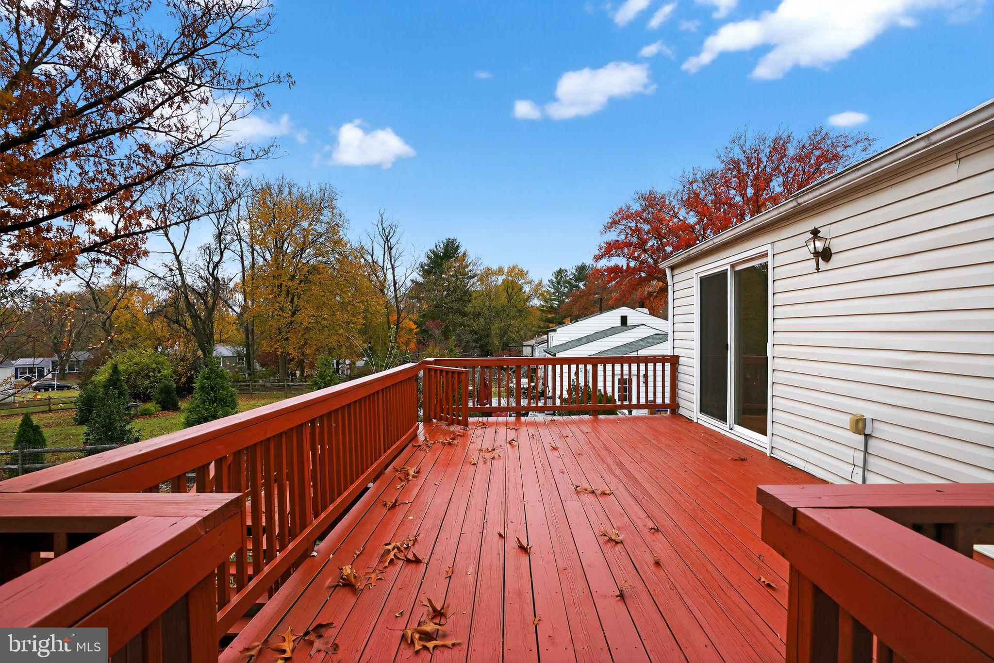 1513 Rainbow Drive Silver Spring, MD 20905 - Photo 58 of 58 a view of balcony with wooden floor and fence