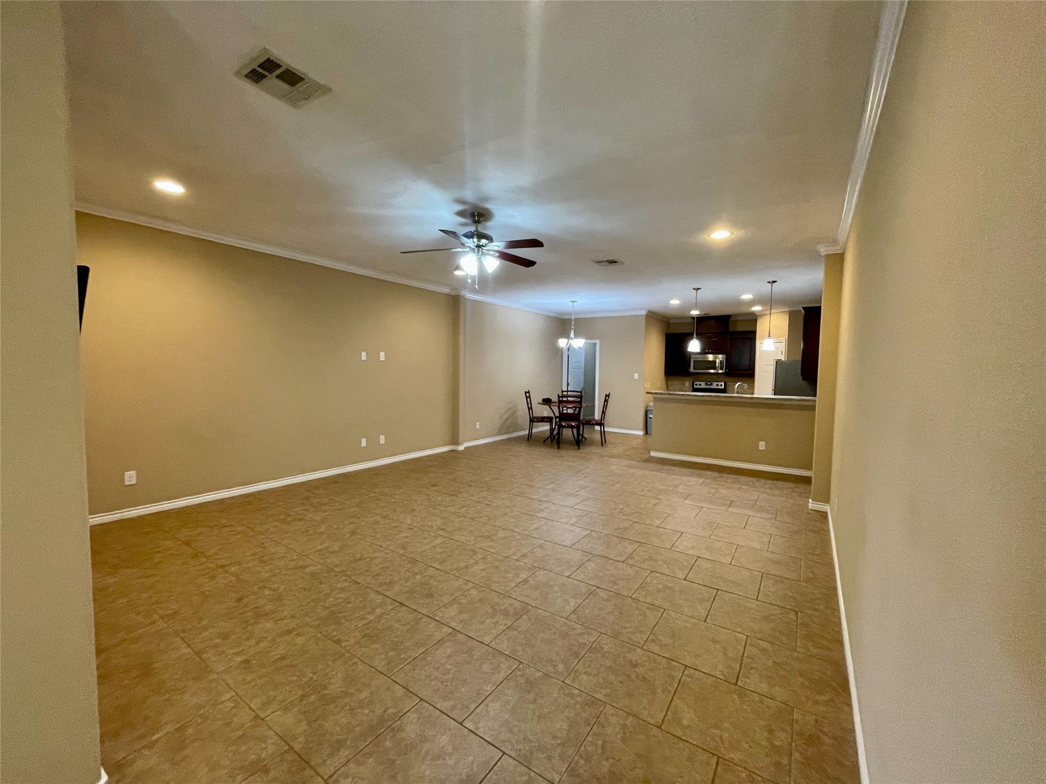 3519 Haverford Road College Station, TX 77845 - Photo 2 of 15 a view of a livingroom and a kitchen