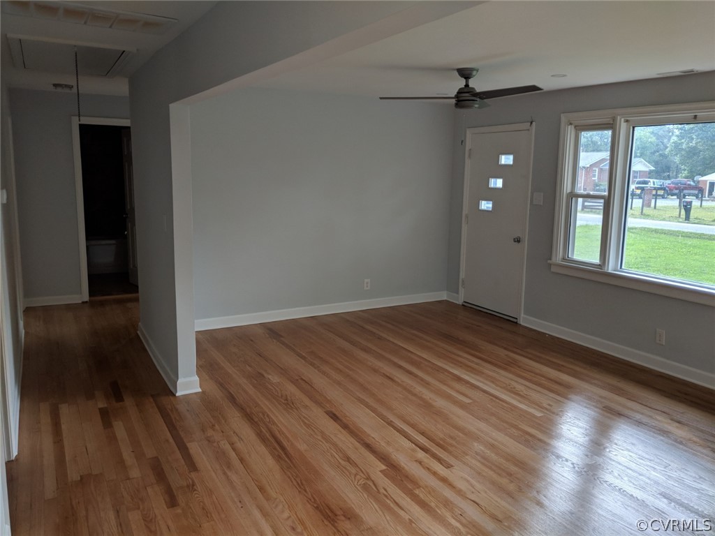 8523 Peaks Road Hanover, VA 23069 - Photo 9 of 35 wooden floor in an empty room with a window