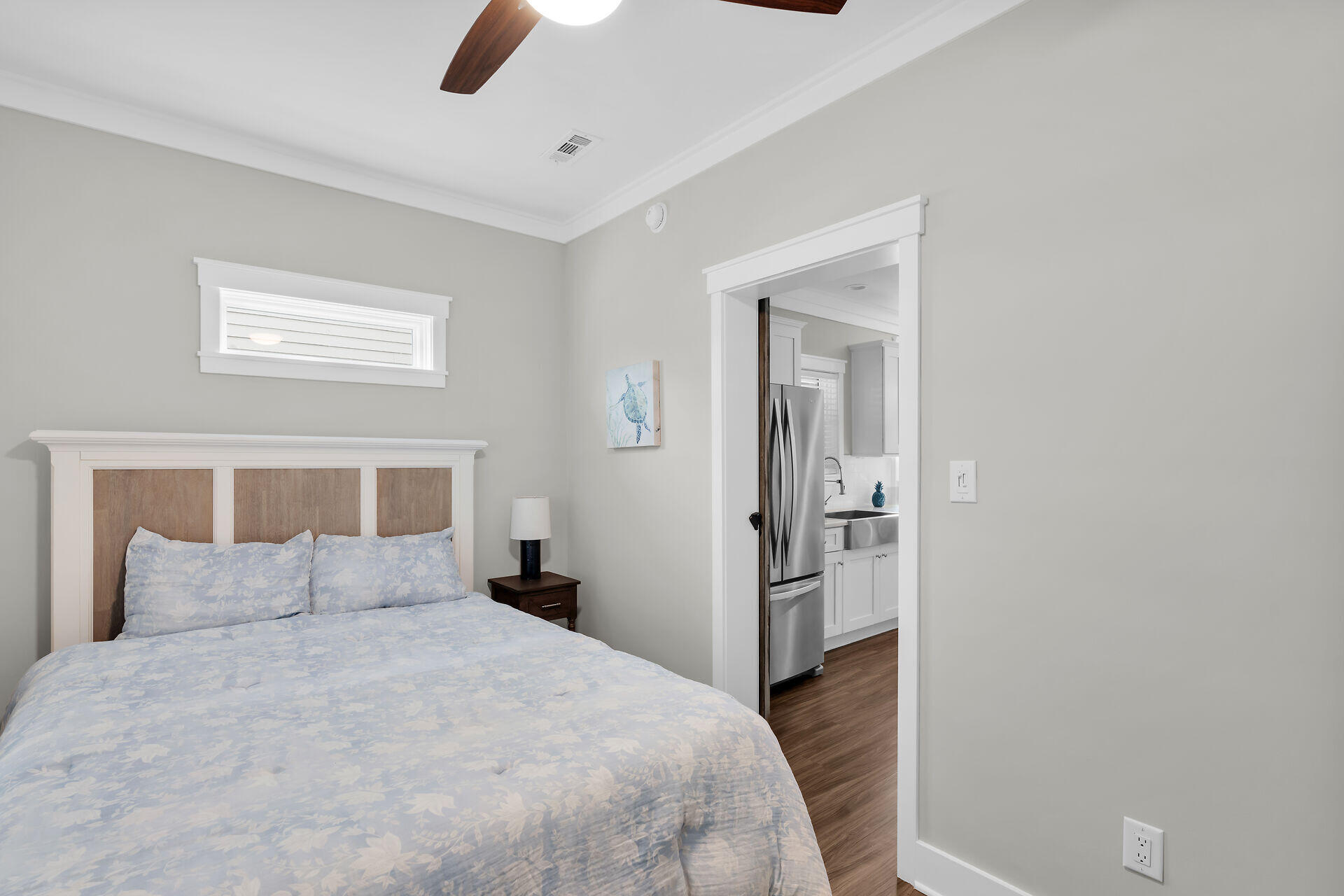 101 11th Street, Unit 19 Marathon, FL 33050 - Photo 10 of 27 a bedroom with a bed and painting on the wall