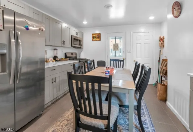 a view of a dining room with furniture