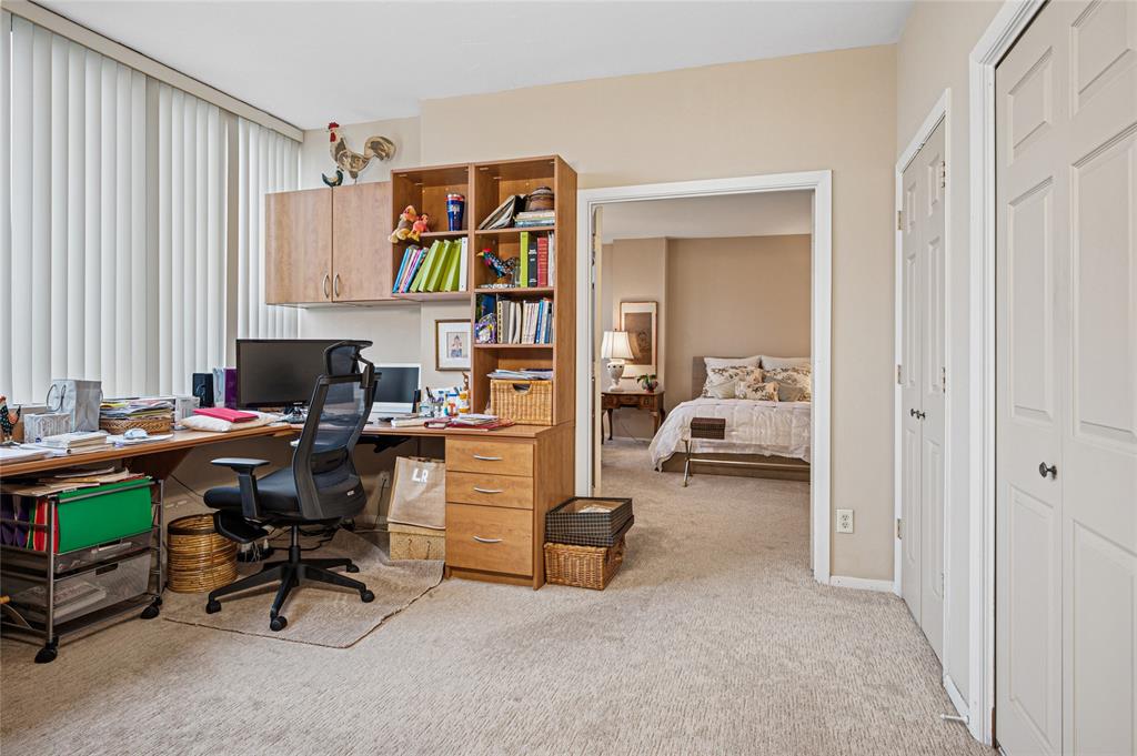5200 Keller Springs Road, Unit 632 Dallas, TX 75248 - Photo 12 of 36 a view of a workspace with furniture and toys