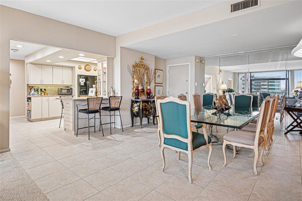 5200 Keller Springs Road, Unit 632 Dallas, TX 75248 - Photo 2 of 36 a view of a dining room with furniture