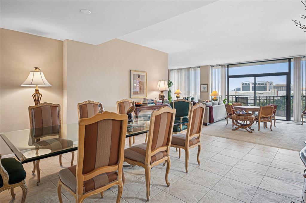 5200 Keller Springs Road, Unit 632 Dallas, TX 75248 - Photo 3 of 36 a view of a dining room with furniture