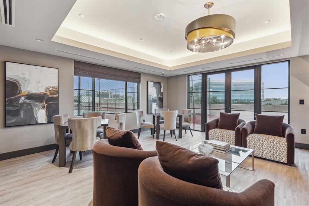 5200 Keller Springs Road, Unit 632 Dallas, TX 75248 - Photo 34 of 36 a living room with furniture and a large window