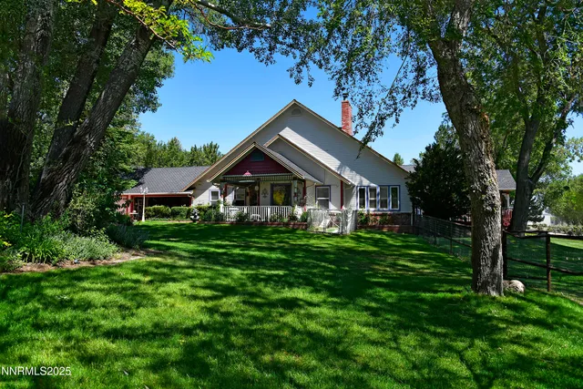 front view of a house with a fence