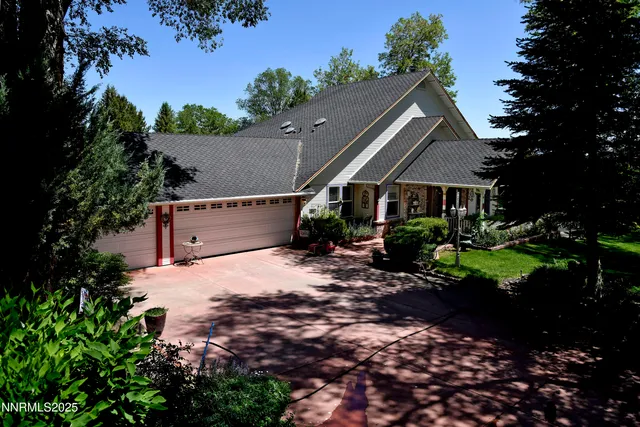 a living room with furniture rug and window