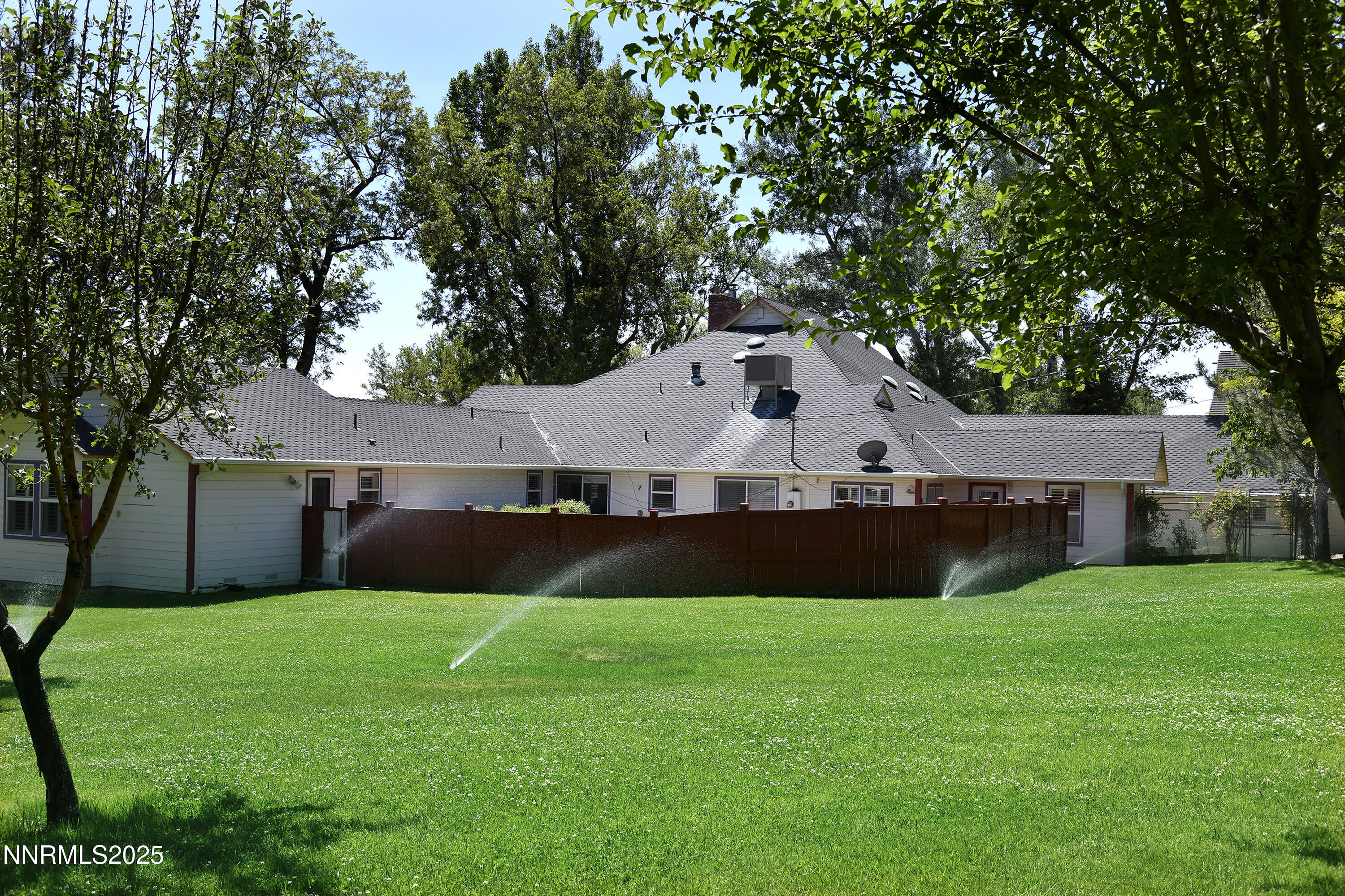 775 Foothill Road Gardnerville, NV 89460 - Photo 18 of 90 a front view of house with yard and green space
