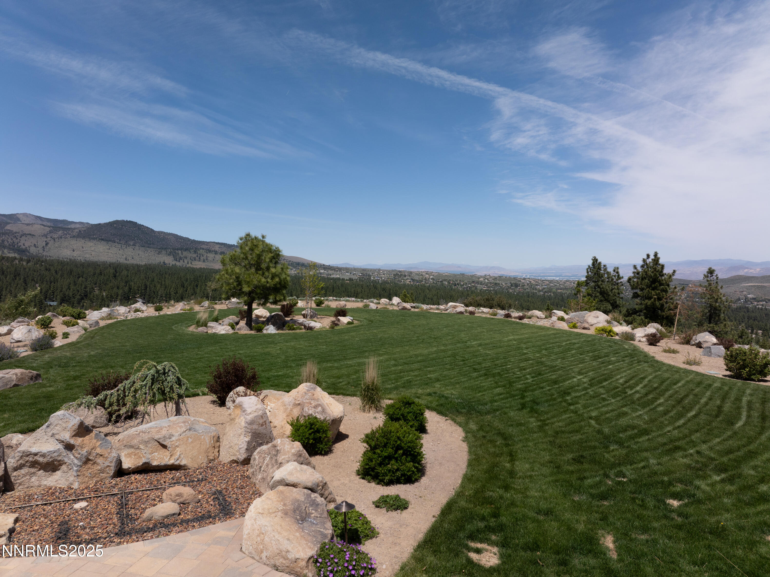 775 Foothill Road Gardnerville, NV 89460 - Photo 20 of 90 a view of a lake with a mountain in the background