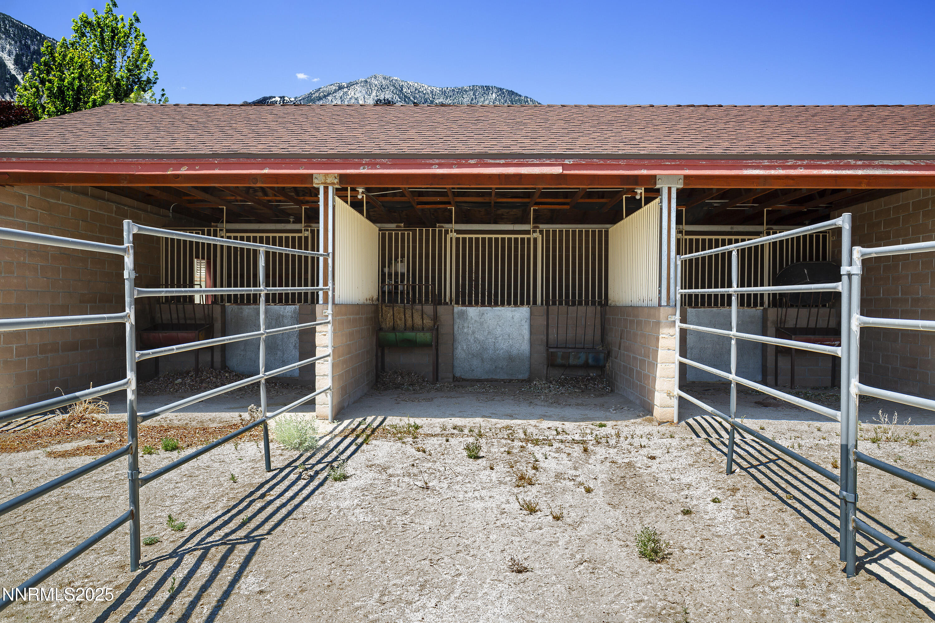 775 Foothill Road Gardnerville, NV 89460 - Photo 27 of 90 a view of house with wooden floor and a gate