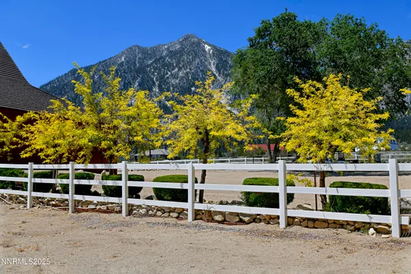 a room with gym equipment and a large window