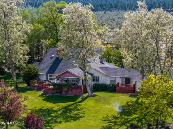 a view of a backyard with mountain view