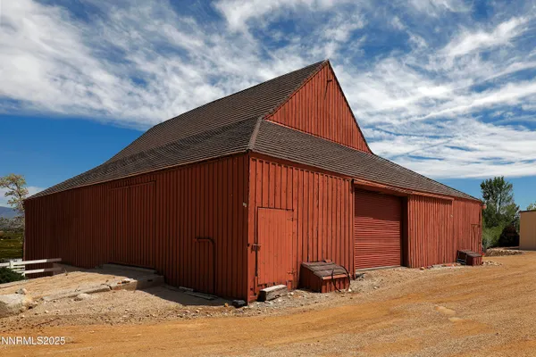 a view of a lake with a large trees