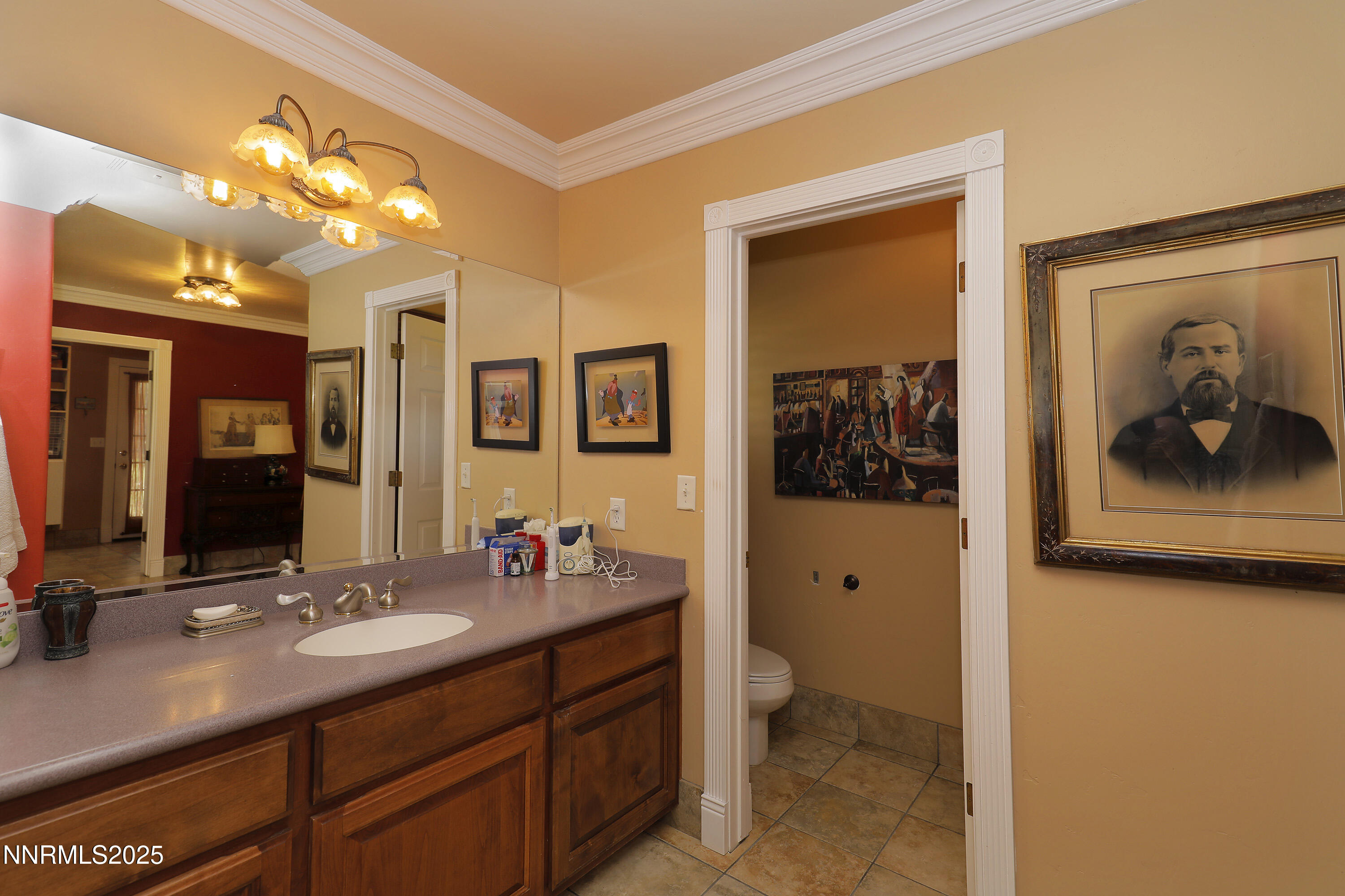 775 Foothill Road Gardnerville, NV 89460 - Photo 44 of 90 a en suite bathroom with a sink double vanity and a mirror