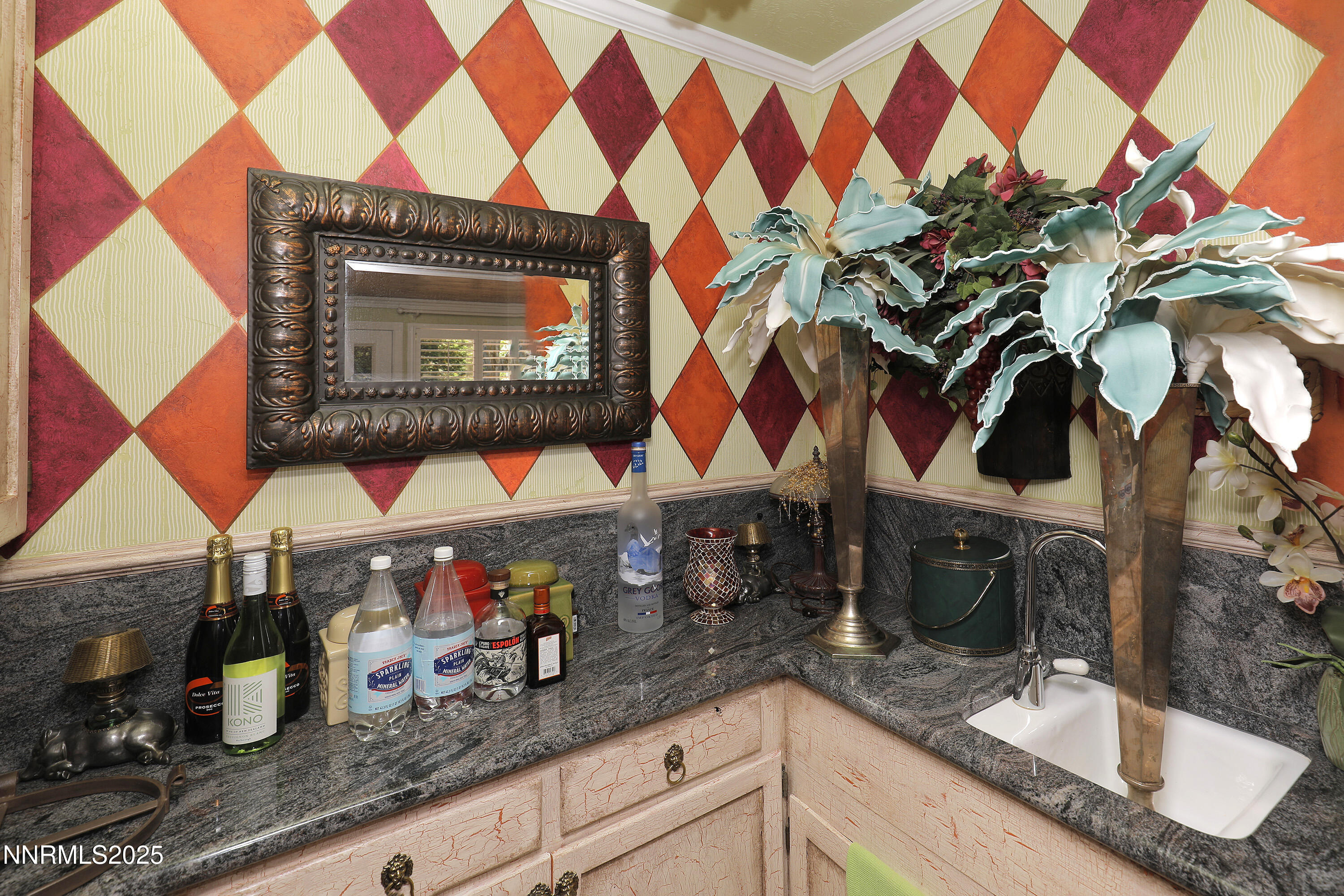 775 Foothill Road Gardnerville, NV 89460 - Photo 50 of 90 a kitchen with granite countertop lots of clutter and stainless steel appliances