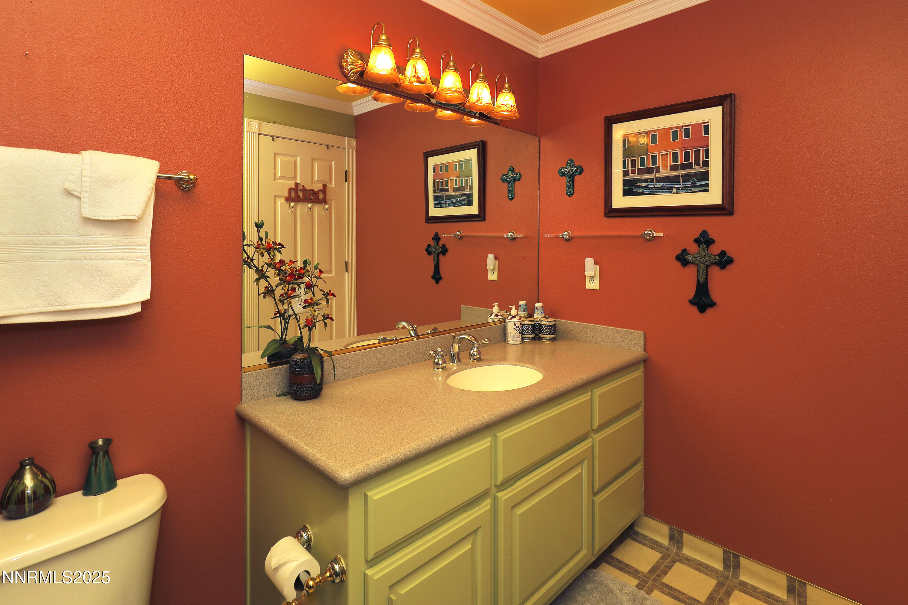 775 Foothill Road Gardnerville, NV 89460 - Photo 51 of 90 a bathroom with a sink and a mirror
