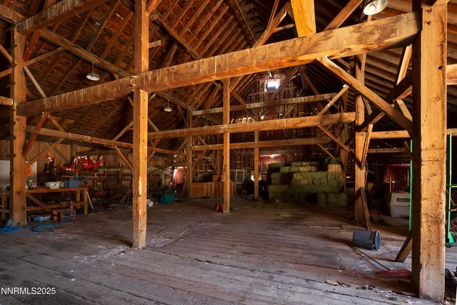 a view of parking garage with cars