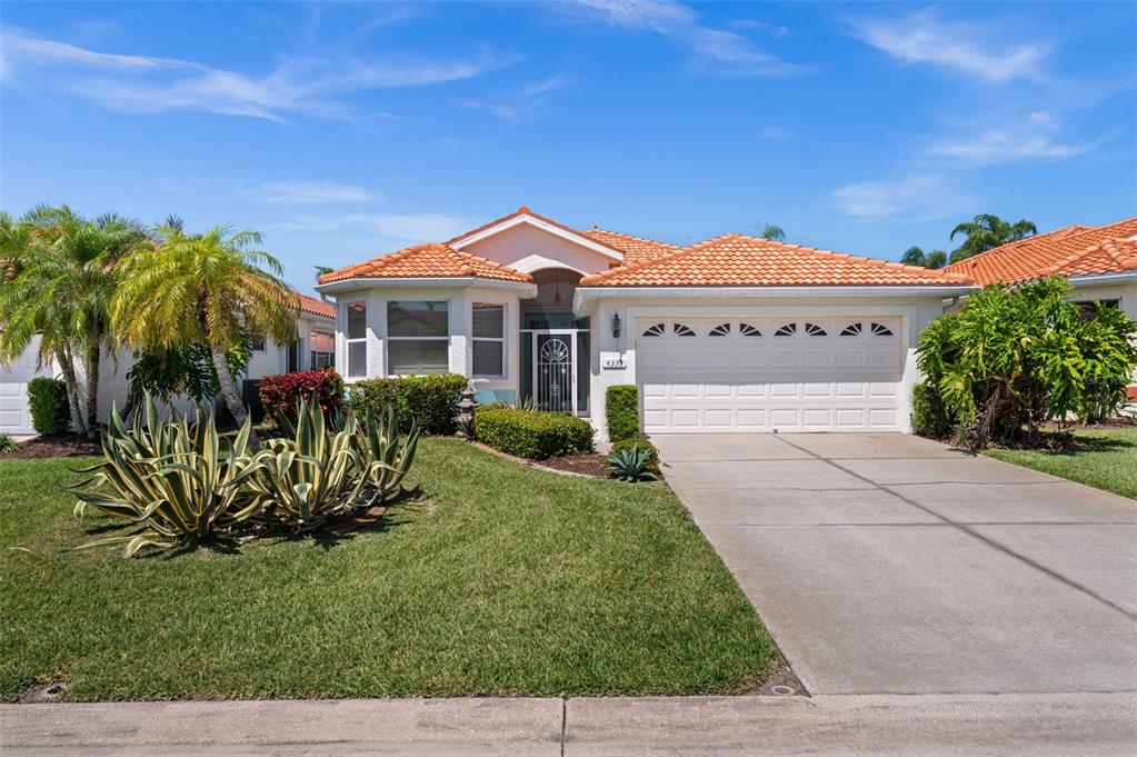 4333 Spicetree Street Venice, FL 34293 - Photo 1 of 29 a front view of a house with a yard
