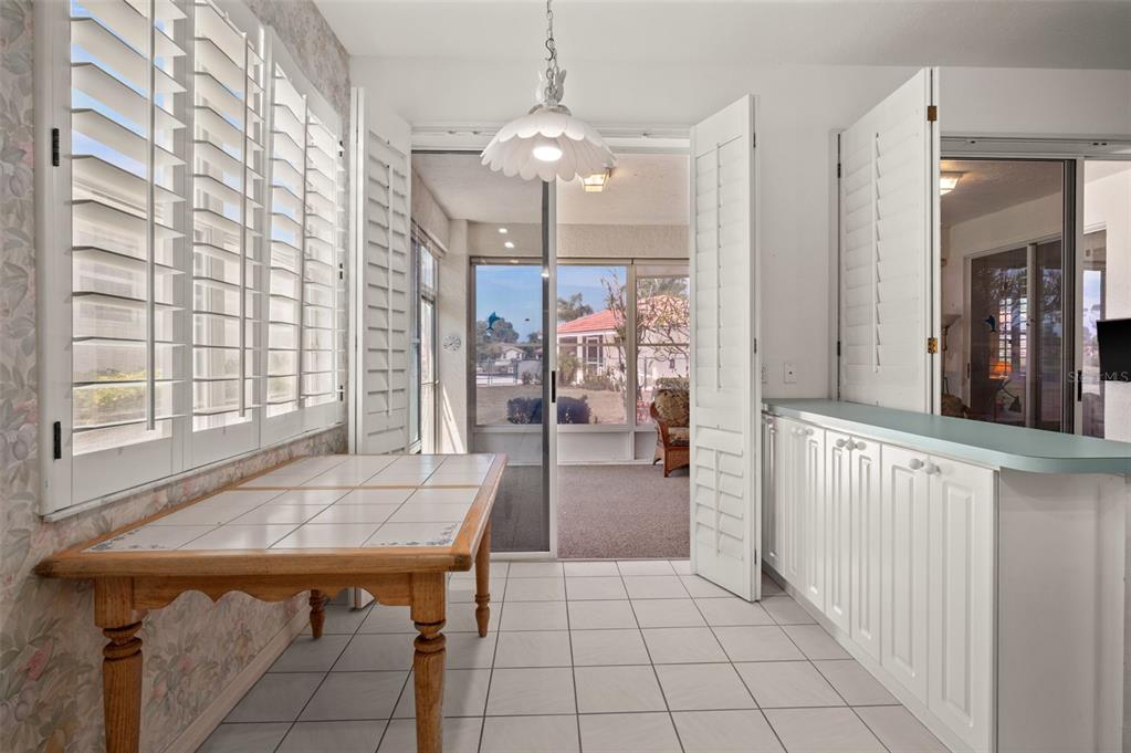 4333 Spicetree Street Venice, FL 34293 - Photo 12 of 29 a dining room with table and chairs