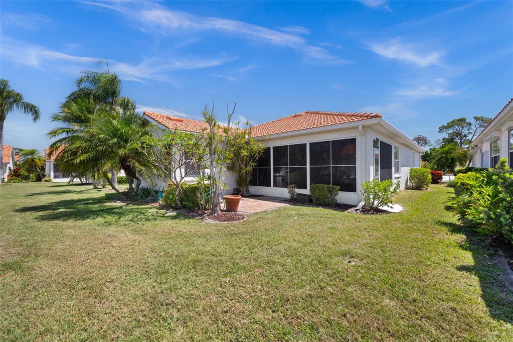 4333 Spicetree Street Venice, FL 34293 - Photo 27 of 29 a front view of a house with a yard