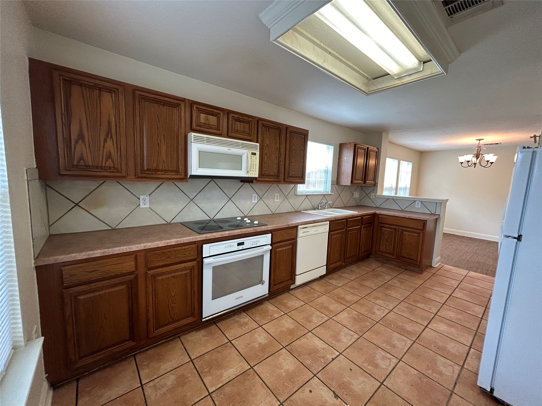 1909 Tranquilo Trail Austin, TX 78744 - Photo 2 of 14 Spacious kitchen