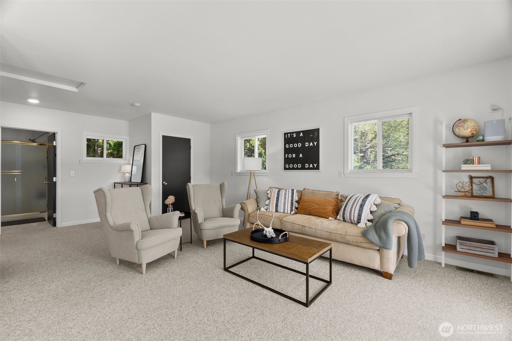 1521 Summit Lake Shore Road Northwest Olympia, WA 98502 - Photo 21 of 40 a living room with furniture and a couch