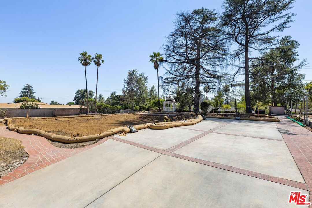 2261 Sinaloa Avenue Altadena, CA 91001 - Photo 5 of 20 a view of a playground with basketball court