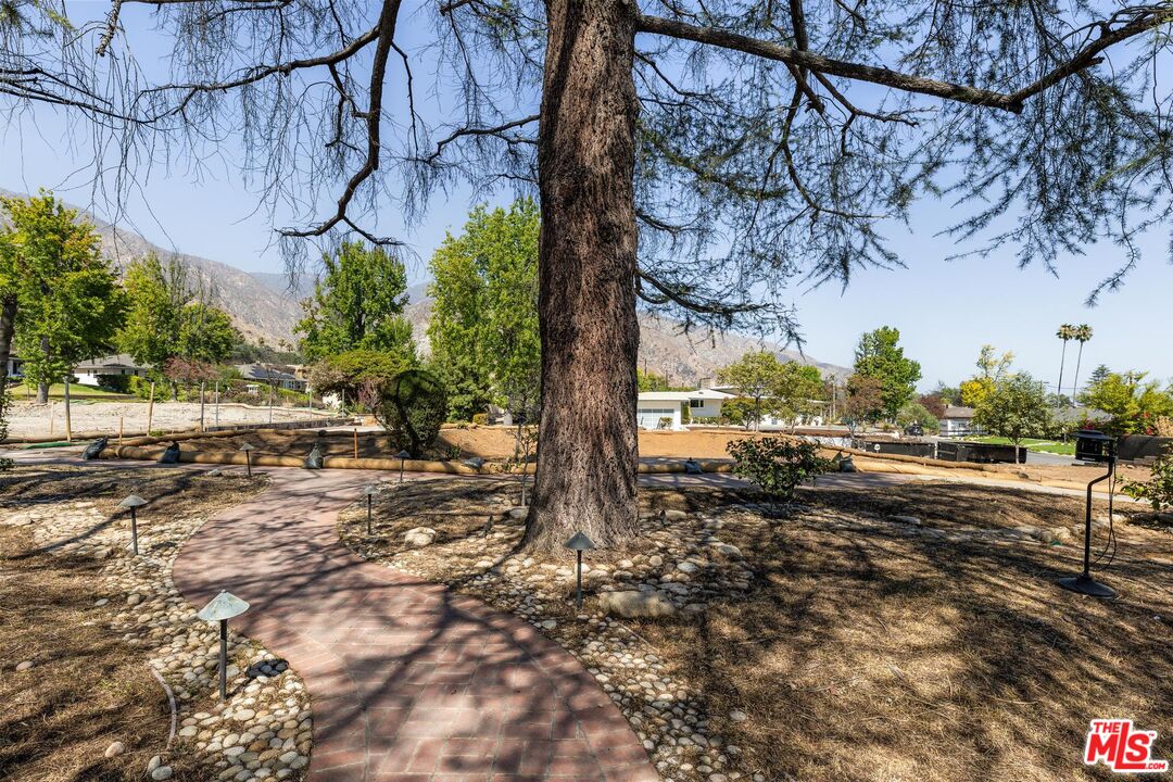 2261 Sinaloa Avenue Altadena, CA 91001 - Photo 8 of 20 a view of a yard with wooden fence