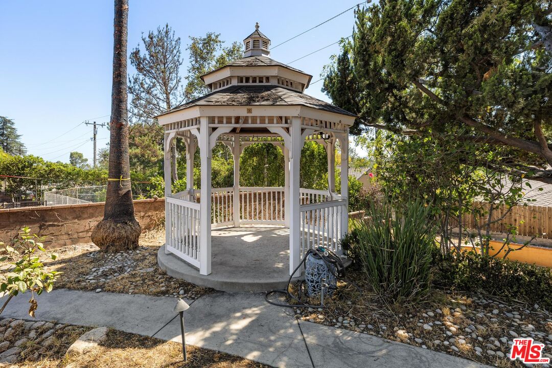 2261 Sinaloa Avenue Altadena, CA 91001 - Photo 9 of 20 a front view of a house with a yard