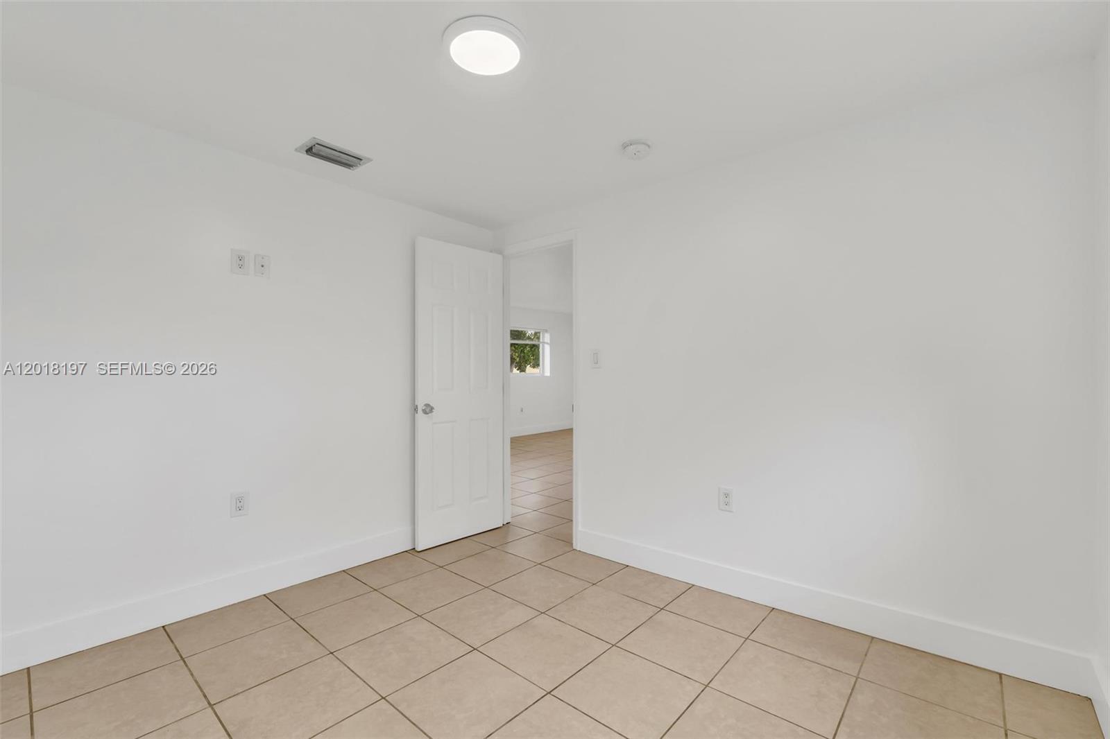 628 Southwest 8th Avenue Homestead, FL 33030 - Photo 18 of 25 a view of an empty room