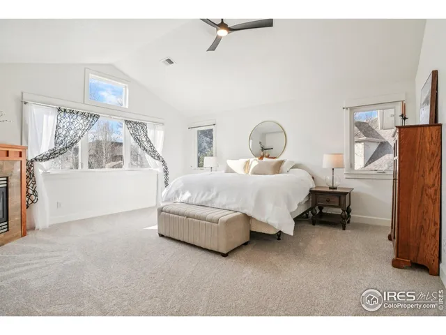 a bedroom with bed and window