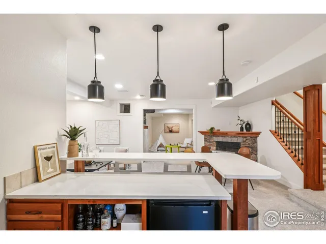 a view of living room with furniture and window