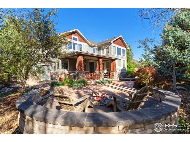 a view of house with yard outdoor seating and entertaining space