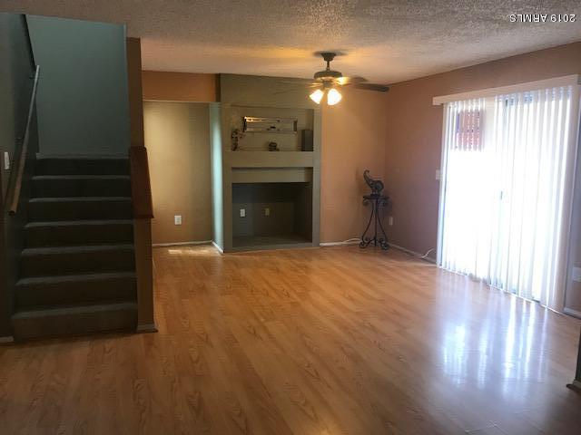 1645 West Baseline Road, Unit 2009 Mesa, AZ 85202 - Photo 5 of 24 Kevin-Baseline Living Room and Stairs