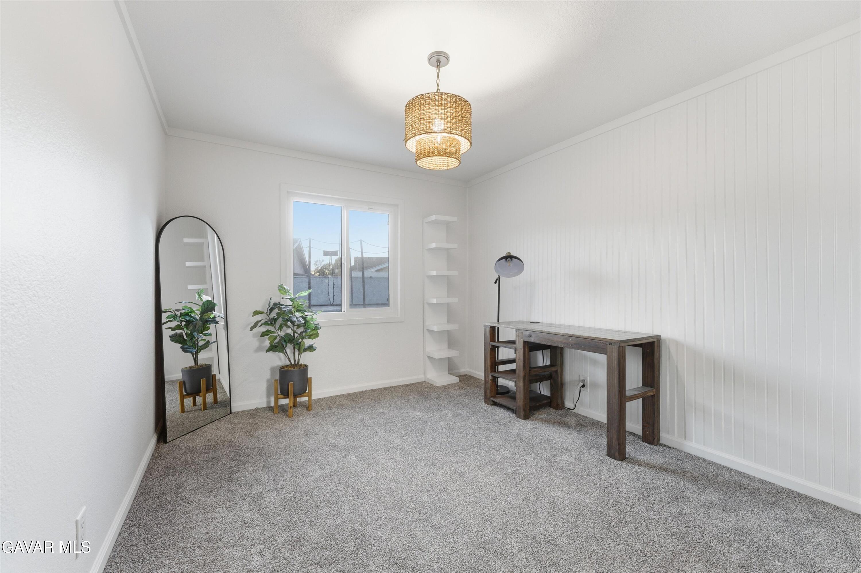 43851 Fern Avenue Lancaster, CA 93534 - Photo 14 of 20 a view of an empty room with a window