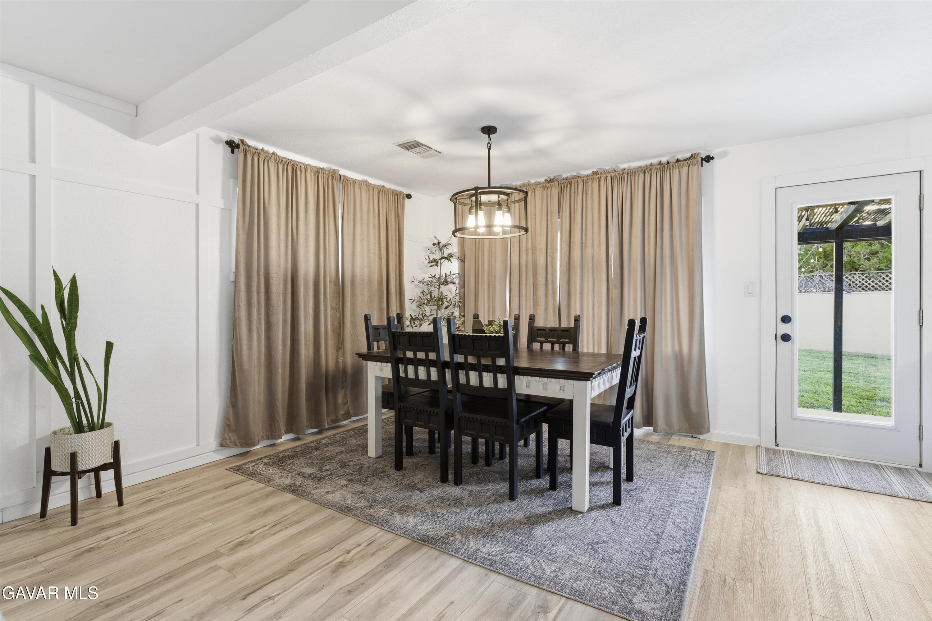 43851 Fern Avenue Lancaster, CA 93534 - Photo 3 of 20 a view of a dining room with furniture and window