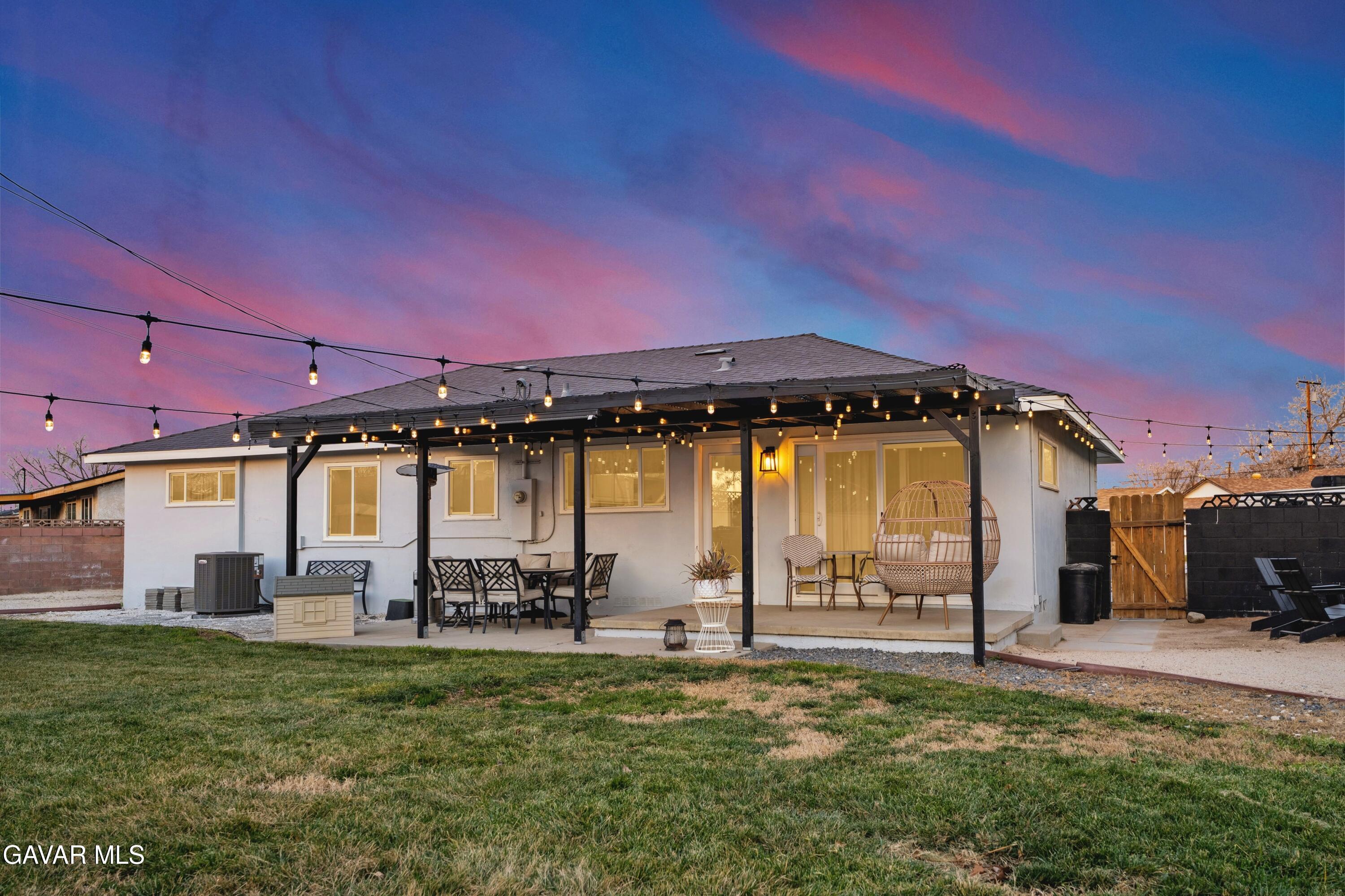 43851 Fern Avenue Lancaster, CA 93534 - Photo 8 of 20 a front view of a house with a yard