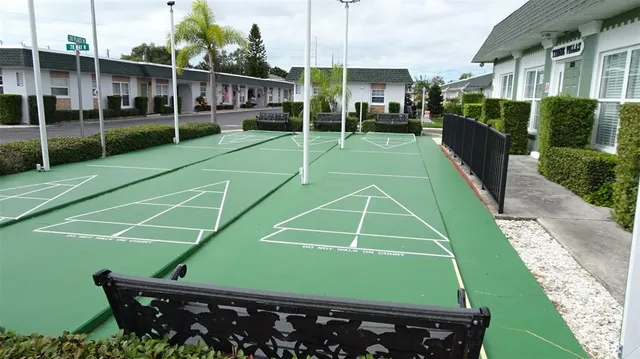 a kitchen with a refrigerator and a stove
