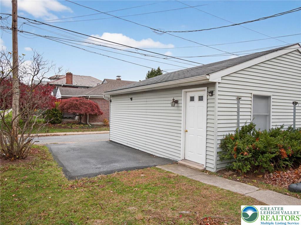 2149 Allen Street Allentown, PA 18104 - Photo 7 of 24 a view of a house with a yard and potted plants