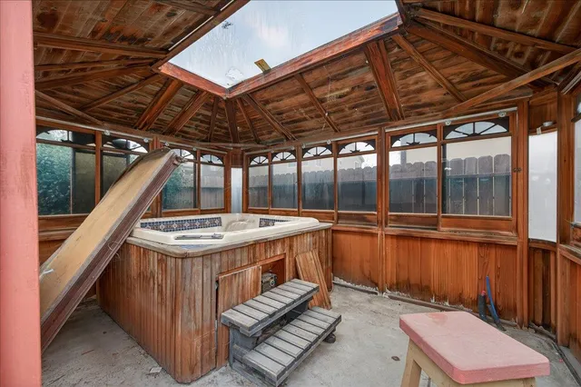 a front view of a house with a yard and porch