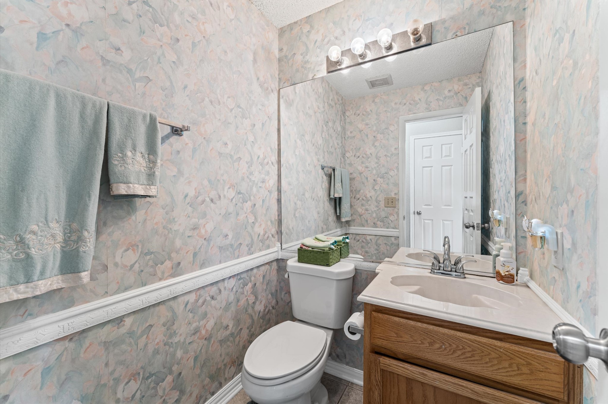 9903 Burntfork Street Houston, TX 77064 - Photo 12 of 25 Half bathroom downstairs.