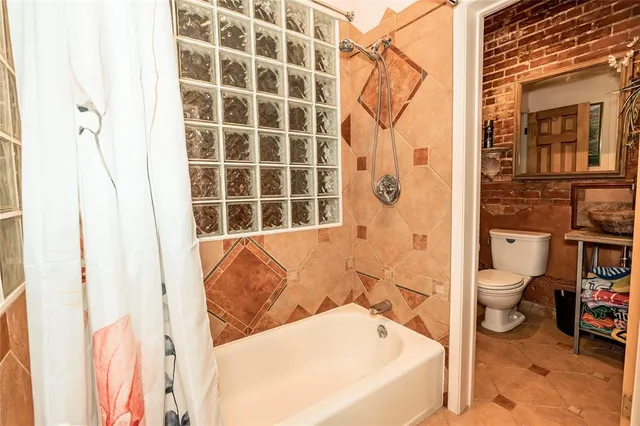 a view of a chairs and tables in patio