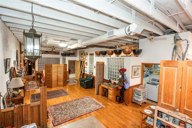 a view of a parking space in back of a building