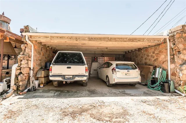 a utility room with furniture and a window