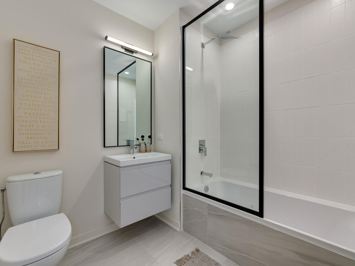 2811 Thatcher Avenue, Unit 301 River Grove, IL 60171 - Photo 17 of 39 a bathroom with a toilet a sink and mirror