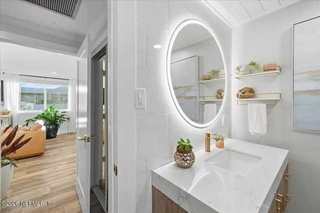 a workspace with furniture and a potted plant