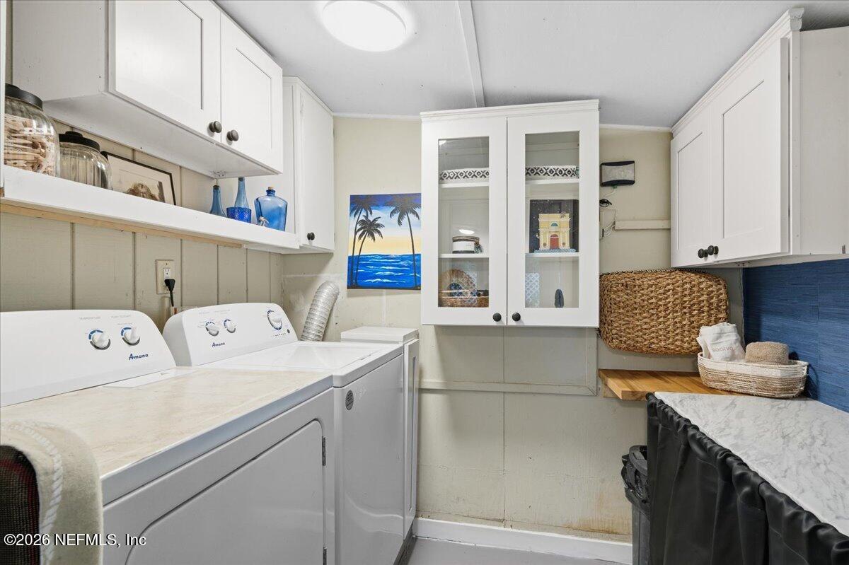 149 Menendez Road St. Augustine, FL 32080 - Photo 38 of 55 Laundry Room With Custom Cabinetry