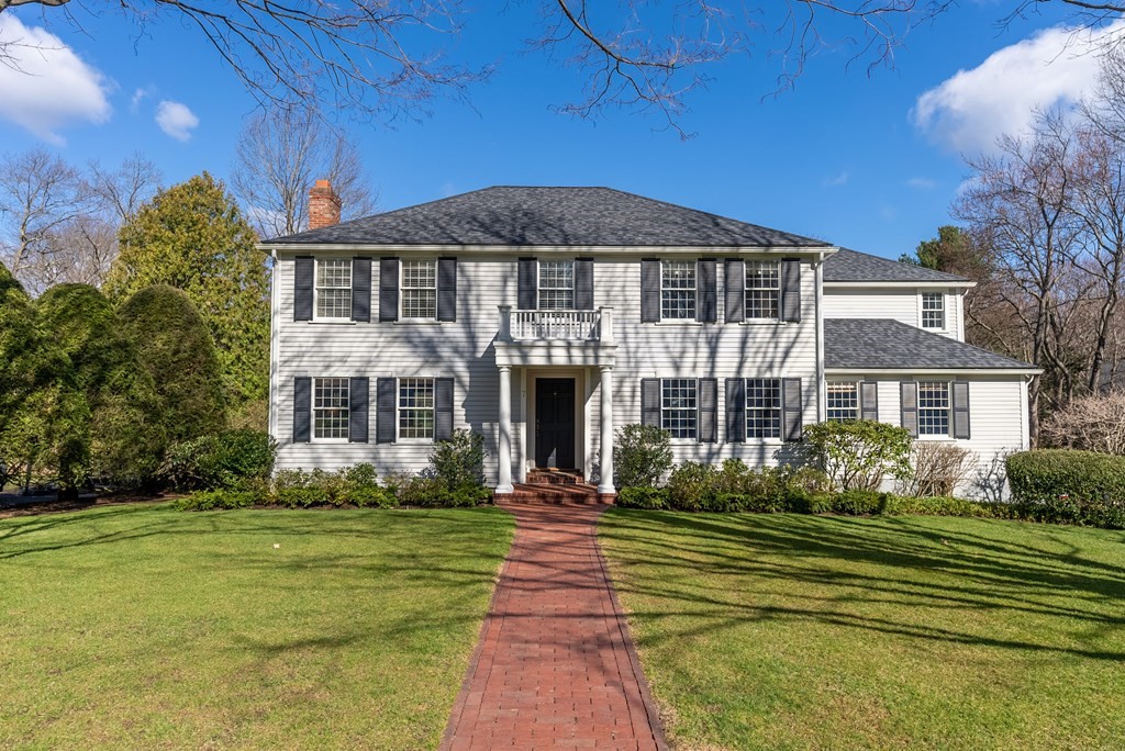 7 Nantucket Road Wellesley, MA 02481 - Photo 1 of 37 a front view of a house with a garden
