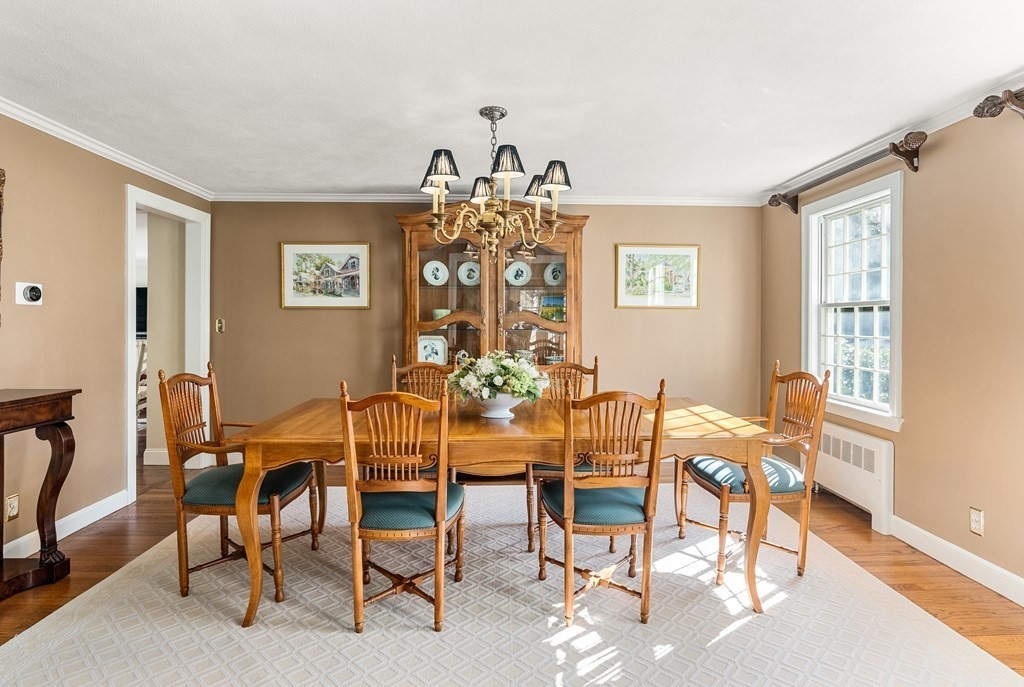 7 Nantucket Road Wellesley, MA 02481 - Photo 13 of 37 a view of a dining room with furniture and chandelier